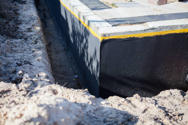 Professional Waterproofing technician working in Powder Springs, TN